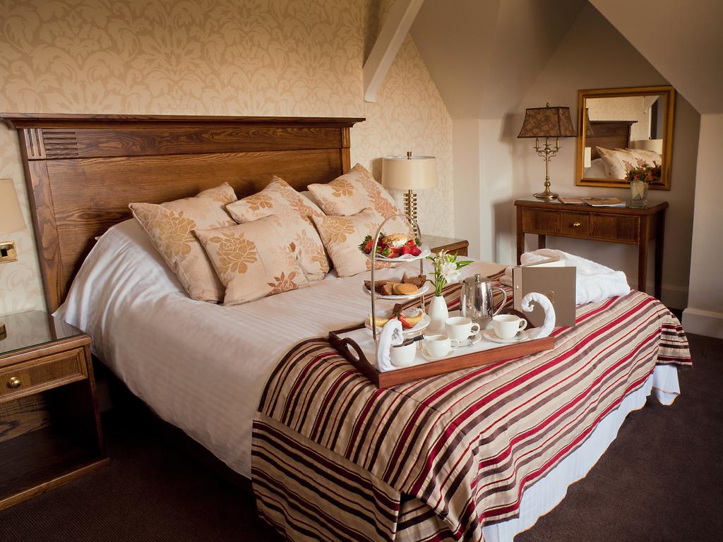 Unwind in Luxury: A Peek Inside Our Individually Decorated Bedrooms Image