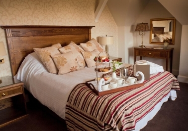 Unwind in Luxury: A Peek Inside Our Individually Decorated Bedrooms Image